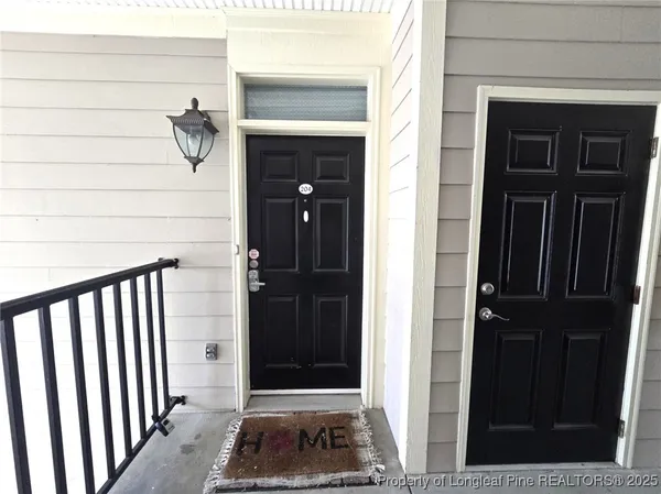 a view of a door and a window