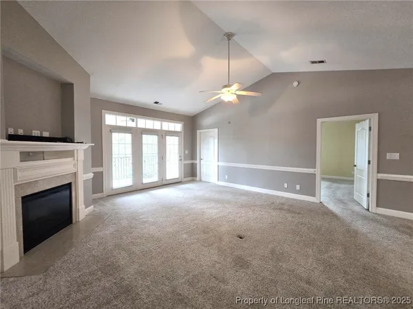 a view of livingroom and fireplace