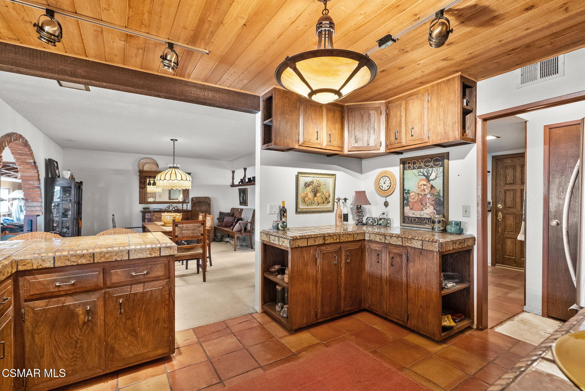 3509 Amarillo Avenue Simi Valley, CA 93063 - Photo 11 of 30 a kitchen with stainless steel appliances granite countertop a sink and cabinets