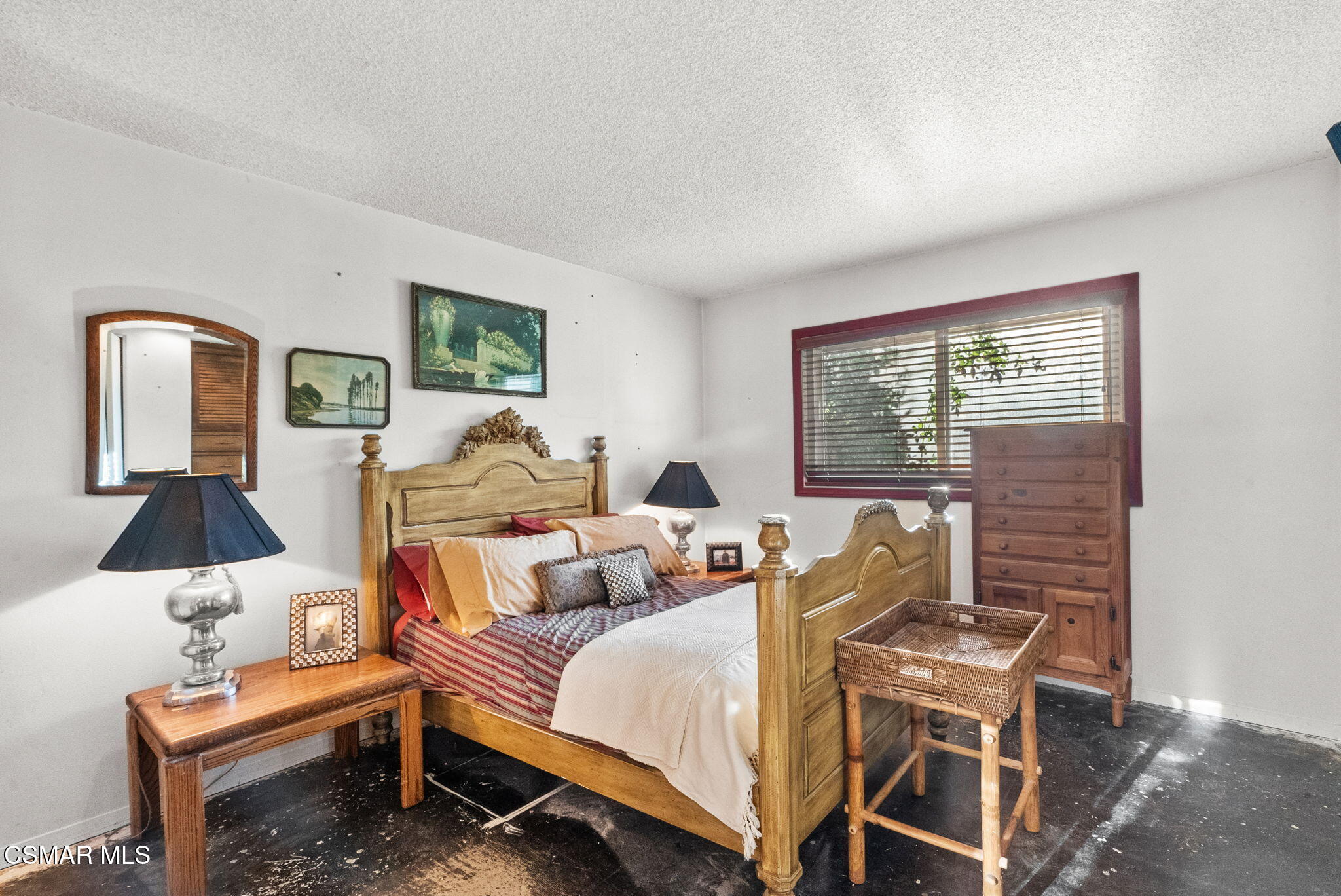 3509 Amarillo Avenue Simi Valley, CA 93063 - Photo 20 of 30 a bedroom with a bed and wooden floor