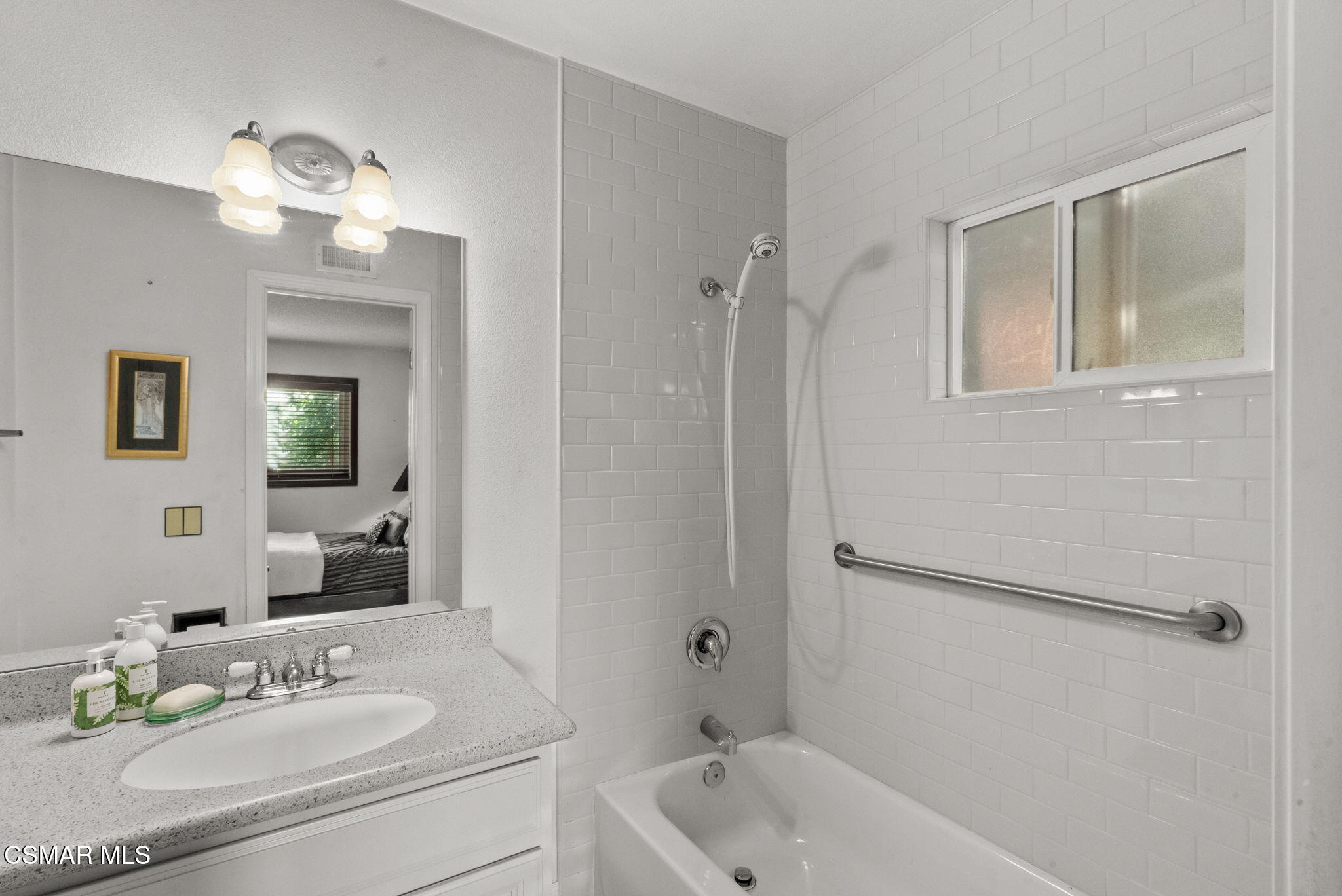 3509 Amarillo Avenue Simi Valley, CA 93063 - Photo 22 of 30 a bathroom with a tub a sink and mirror