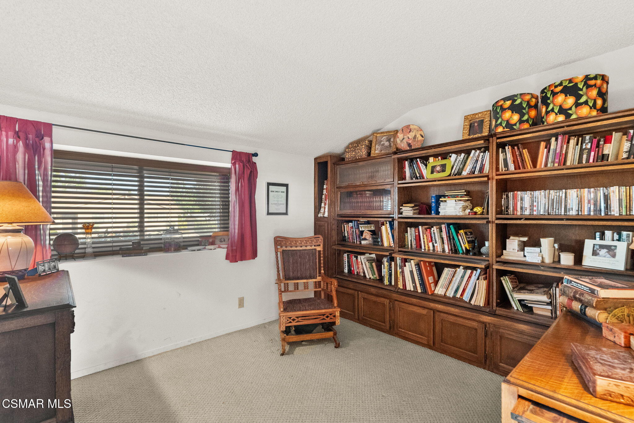 3509 Amarillo Avenue Simi Valley, CA 93063 - Photo 23 of 30 a livingroom with a book shelf
