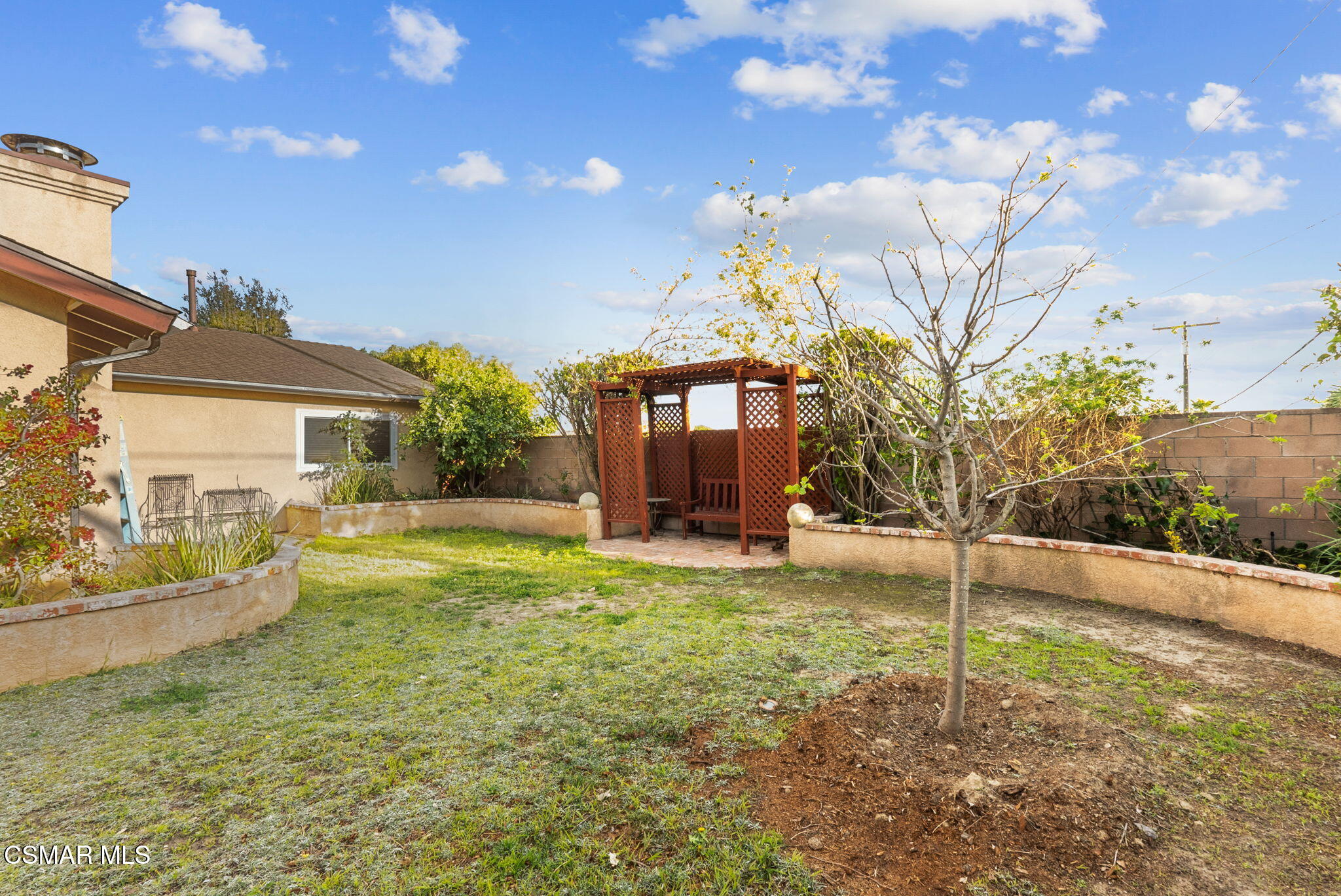 3509 Amarillo Avenue Simi Valley, CA 93063 - Photo 27 of 30 a view of a house with backyard and sitting area
