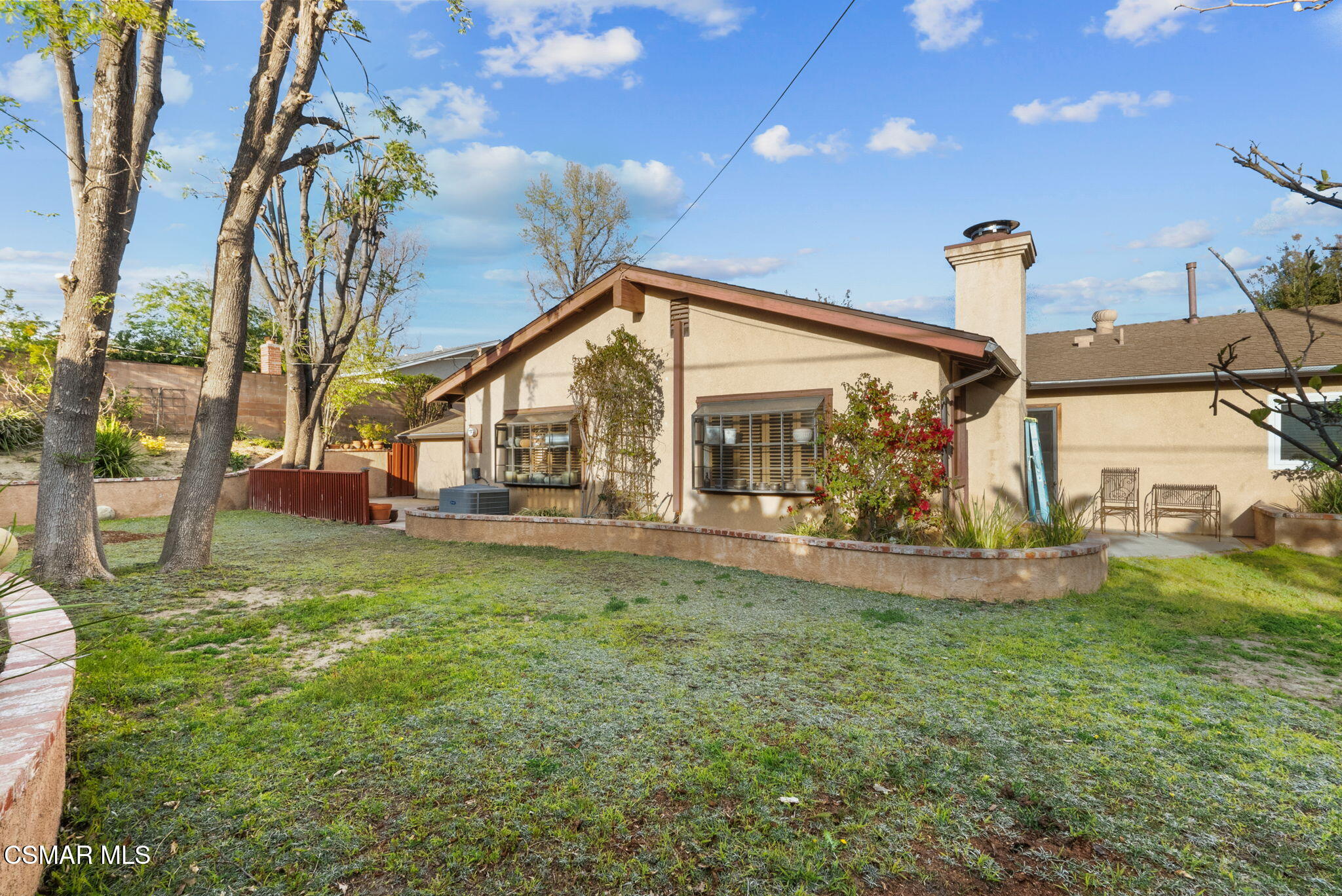 3509 Amarillo Avenue Simi Valley, CA 93063 - Photo 29 of 30 a view of a house with a backyard