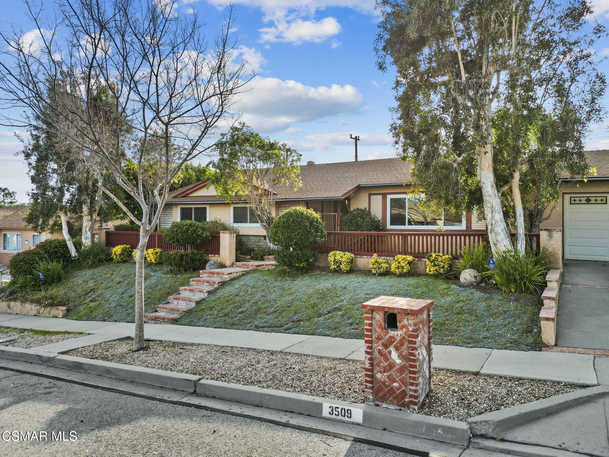 3509 Amarillo Avenue Simi Valley, CA 93063 - Photo 30 of 30 a front view of a house with a yard