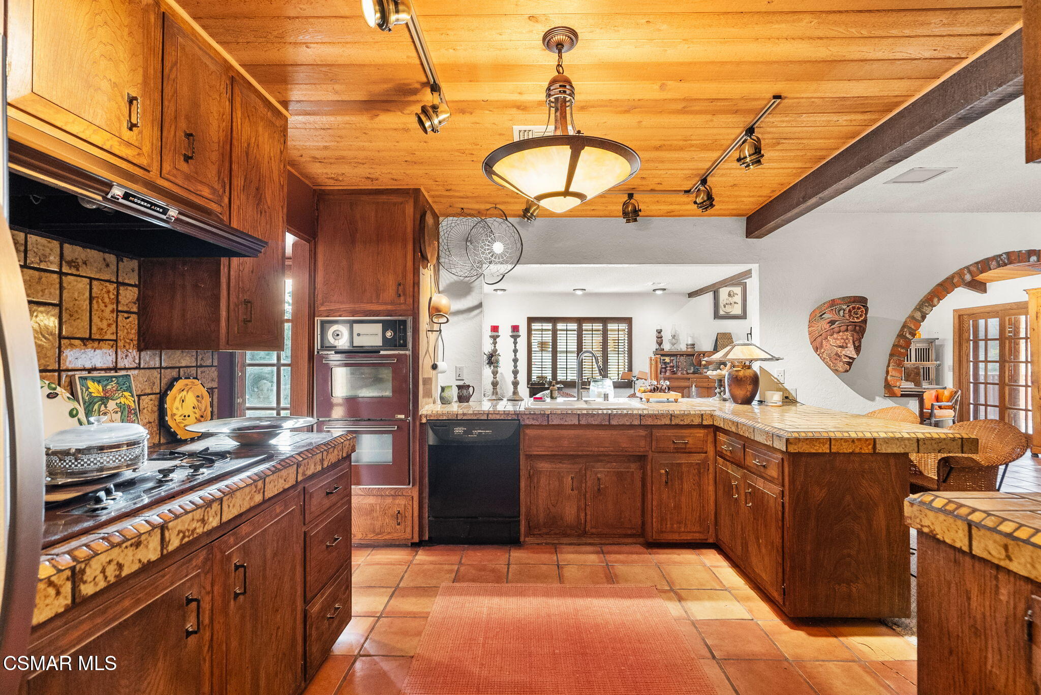 3509 Amarillo Avenue Simi Valley, CA 93063 - Photo 10 of 30 a kitchen with stainless steel appliances granite countertop a stove and a sink