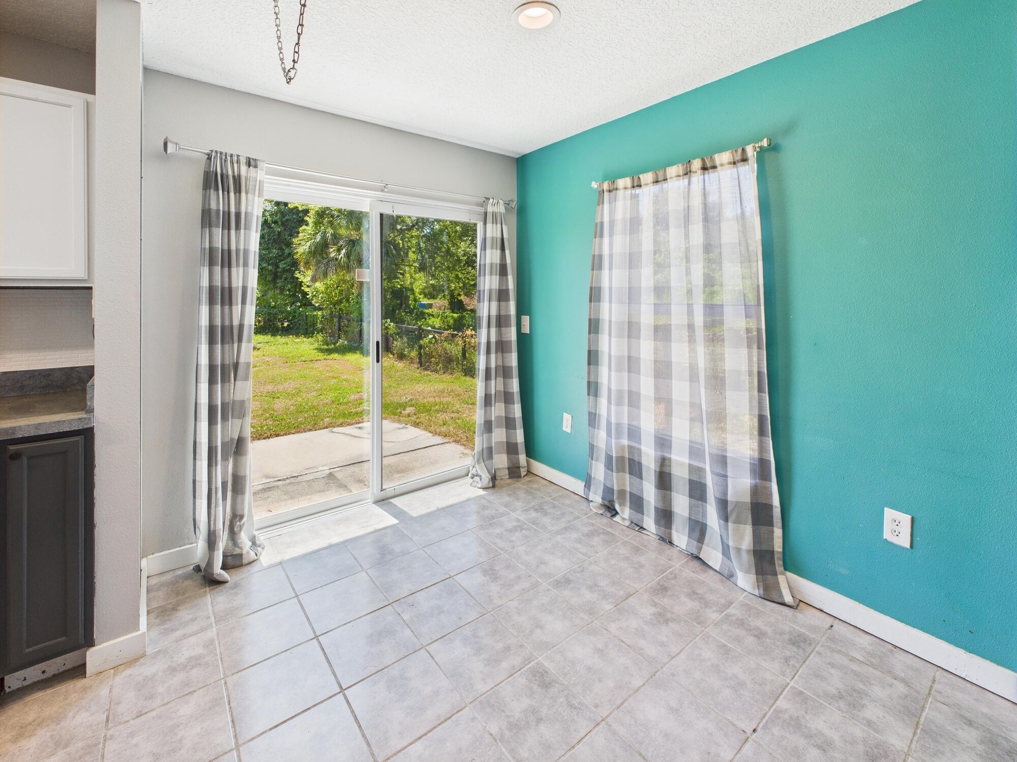6504 Southeast 86th Boulevard Okeechobee, FL 34974 - Photo 13 of 38 a view of an empty room with a window