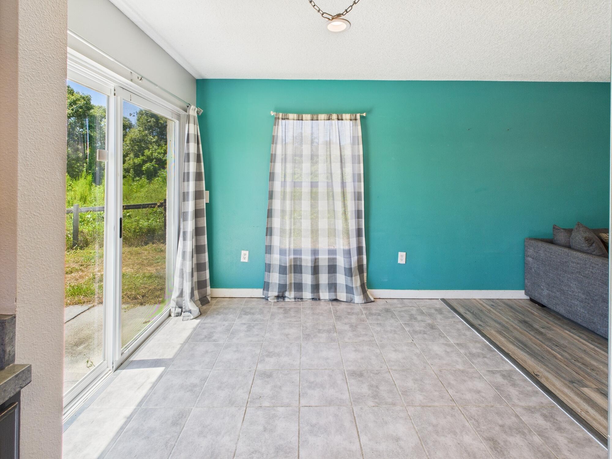 6504 Southeast 86th Boulevard Okeechobee, FL 34974 - Photo 14 of 38 a view of an empty room with a window