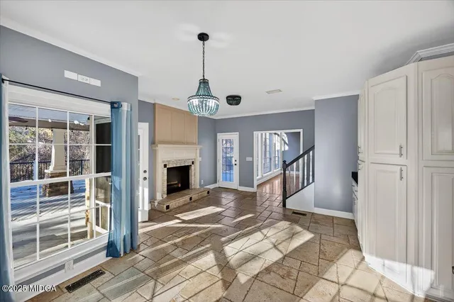 a spacious bathroom with a double vanity sink a mirror and a shower
