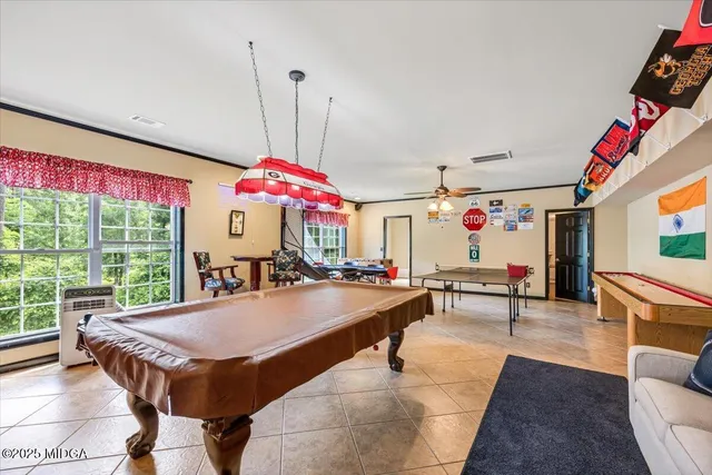 a view of a swimming pool with lounge chair