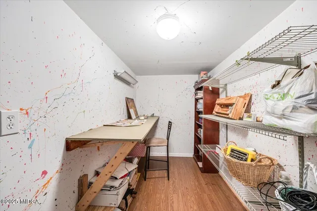 a backyard of a house with lots of green space and sitting area