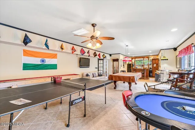 a view of a house with iron fence