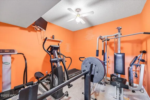 an aerial view of a house with outdoor space