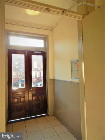 a view of a bathroom with a glass door
