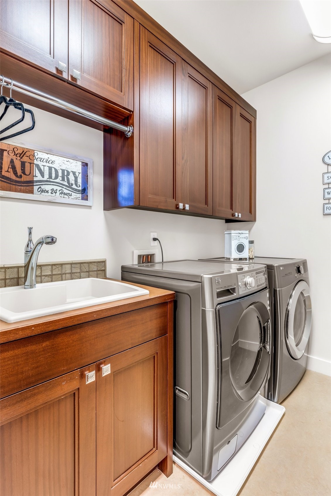 1013 North 42nd Place Renton, WA 98056 - Photo 23 of 39 a utility room with dryer and washer