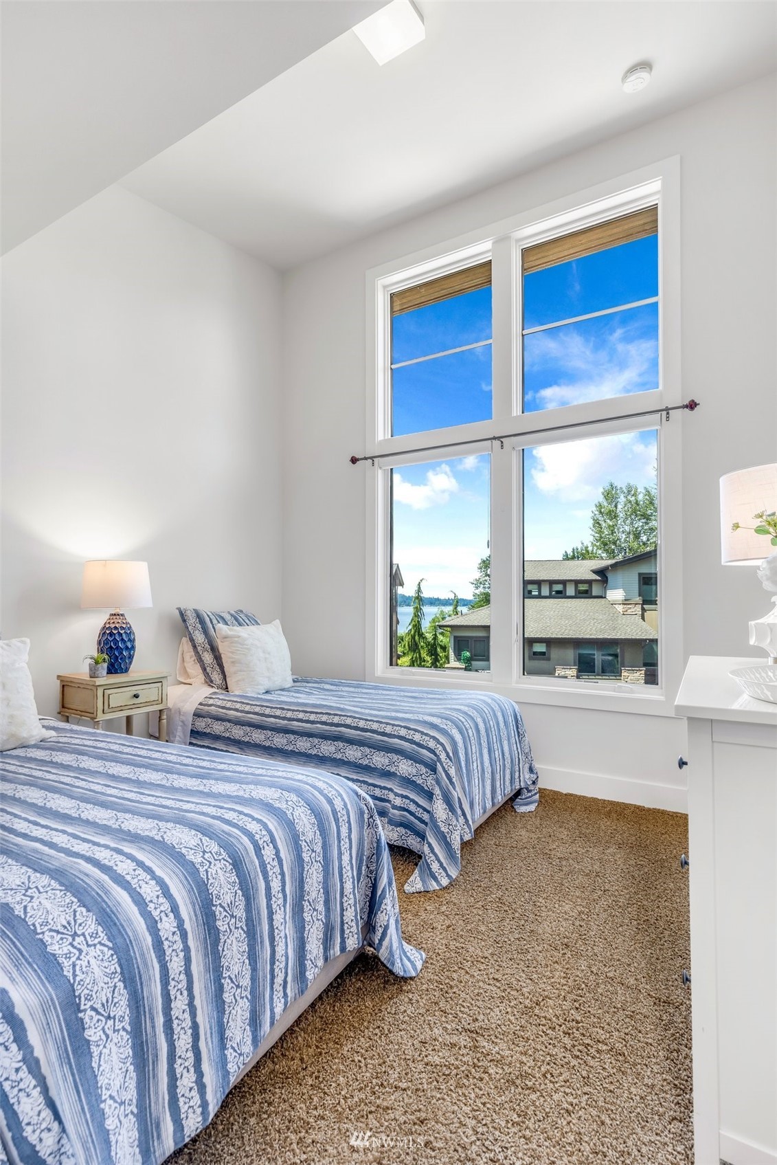 1013 North 42nd Place Renton, WA 98056 - Photo 24 of 39 a bedroom with a bed and window