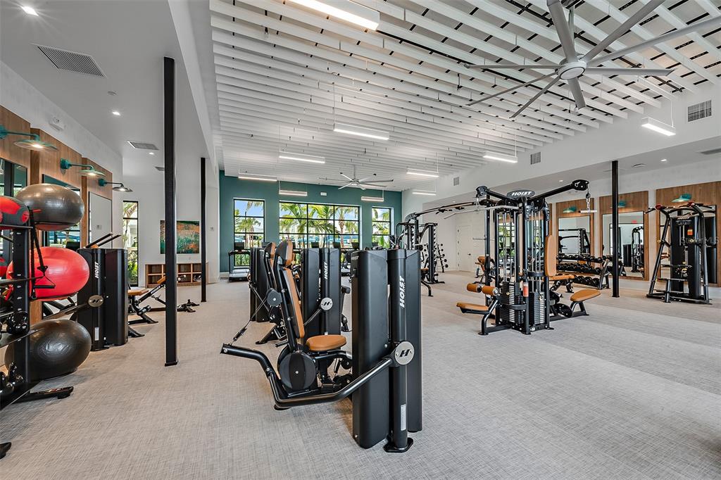 11296 Boundless Terrace Venice, FL 34293 - Photo 23 of 41 a view of a room with gym equipment