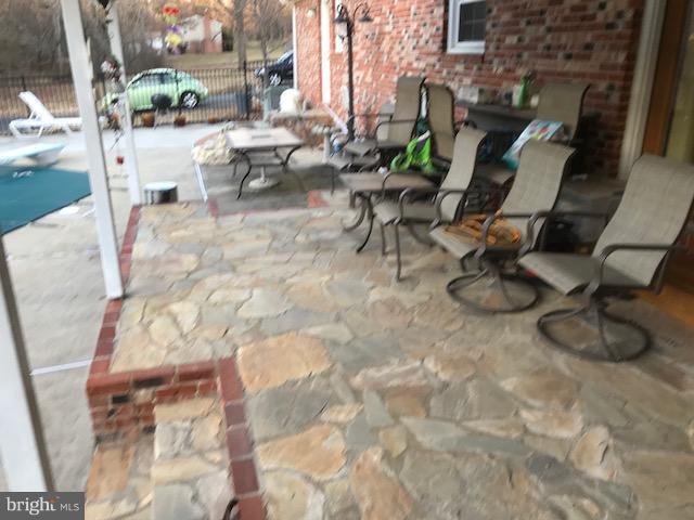 9638 Green Road Midland, VA 22728 - Photo 7 of 13 Beauticul rock xovered patio.