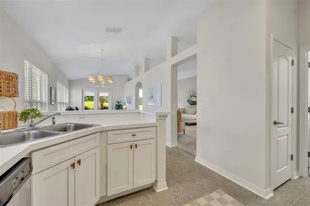 a living room with furniture rug and window