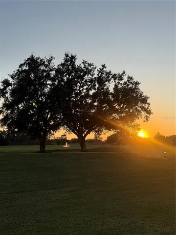 a view of a balcony with chairs