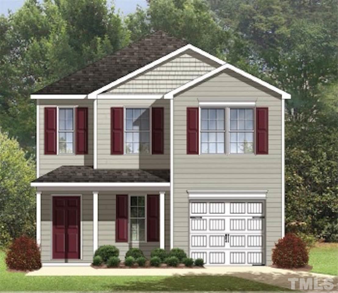 9673 Jernigan Road Spring Hope, NC 27882 - Photo 1 of 24 a front view of a house with a yard