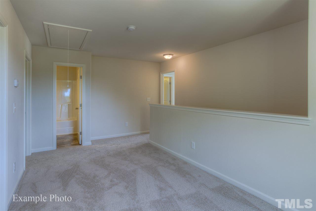 9673 Jernigan Road Spring Hope, NC 27882 - Photo 12 of 24 an empty room with an entryway