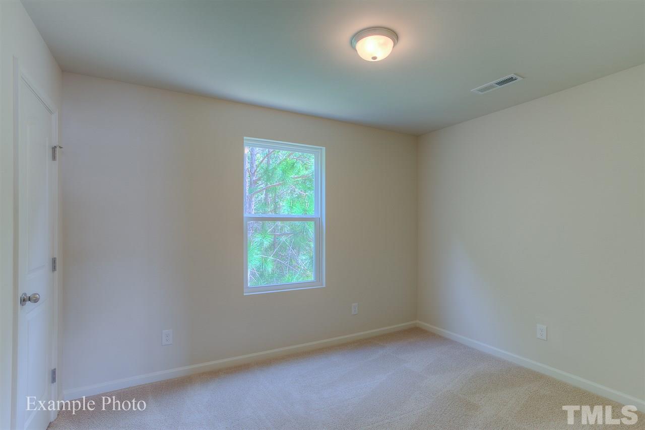 9673 Jernigan Road Spring Hope, NC 27882 - Photo 13 of 24 an empty room with a window