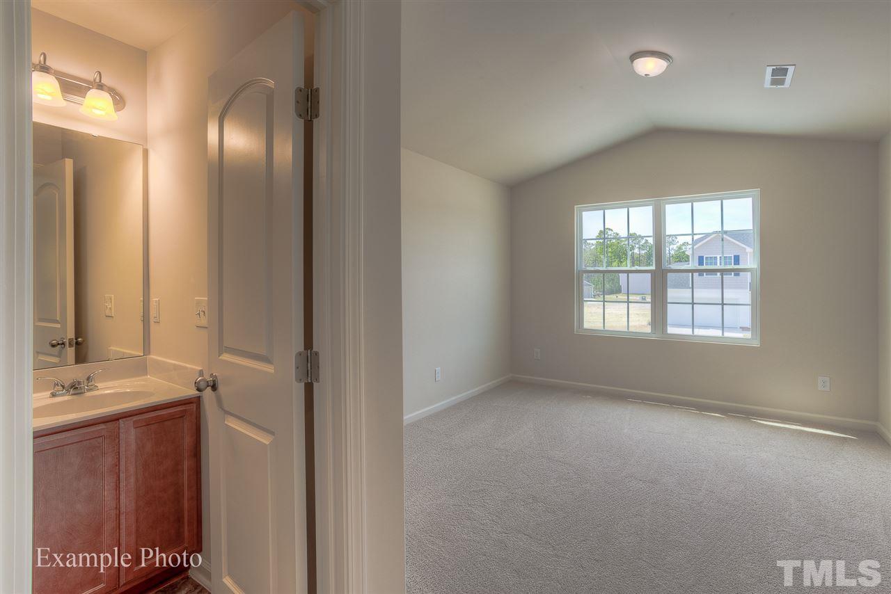 9673 Jernigan Road Spring Hope, NC 27882 - Photo 18 of 24 a view of empty room with window