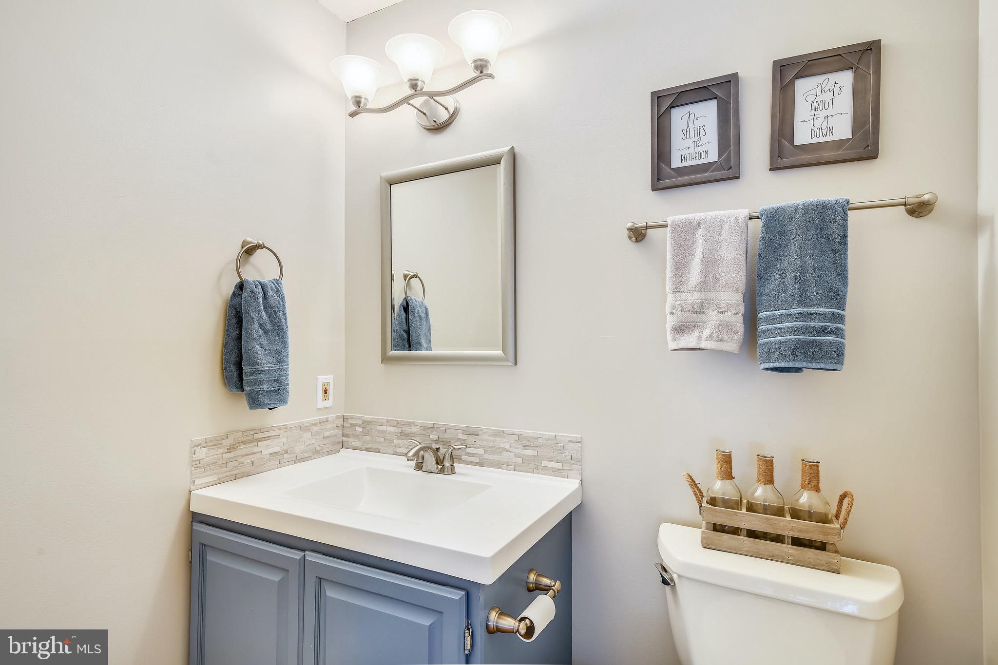 6502 Wilson Road Friendship, MD 20758 - Photo 40 of 64 Main level half-bath/powder room.
