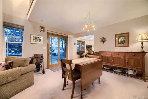 a view of a livingroom with furniture and window