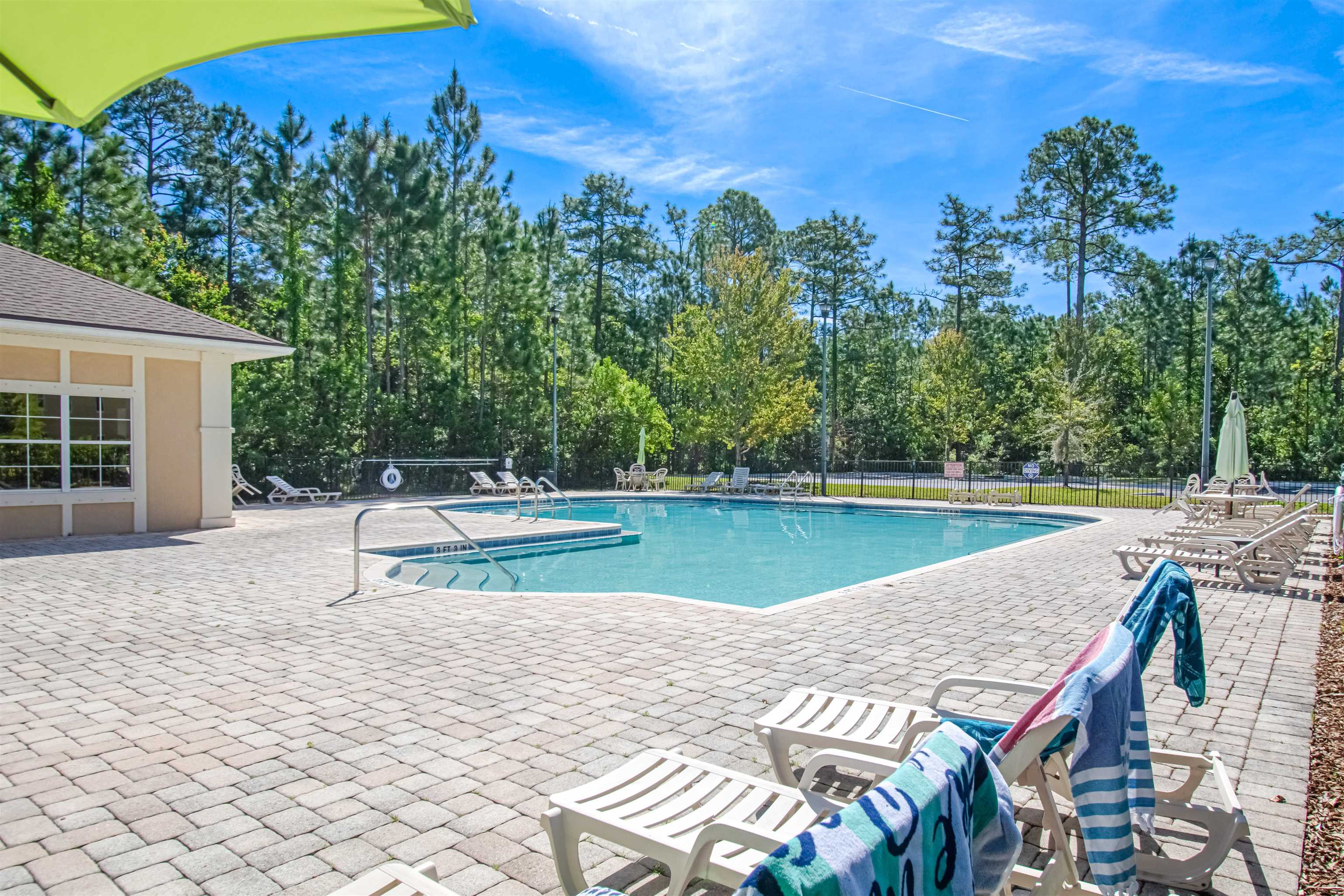 617 Golden Lake Loop St. Augustine, FL 32084 - Photo 4 of 25 a view of swimming pool with a patio