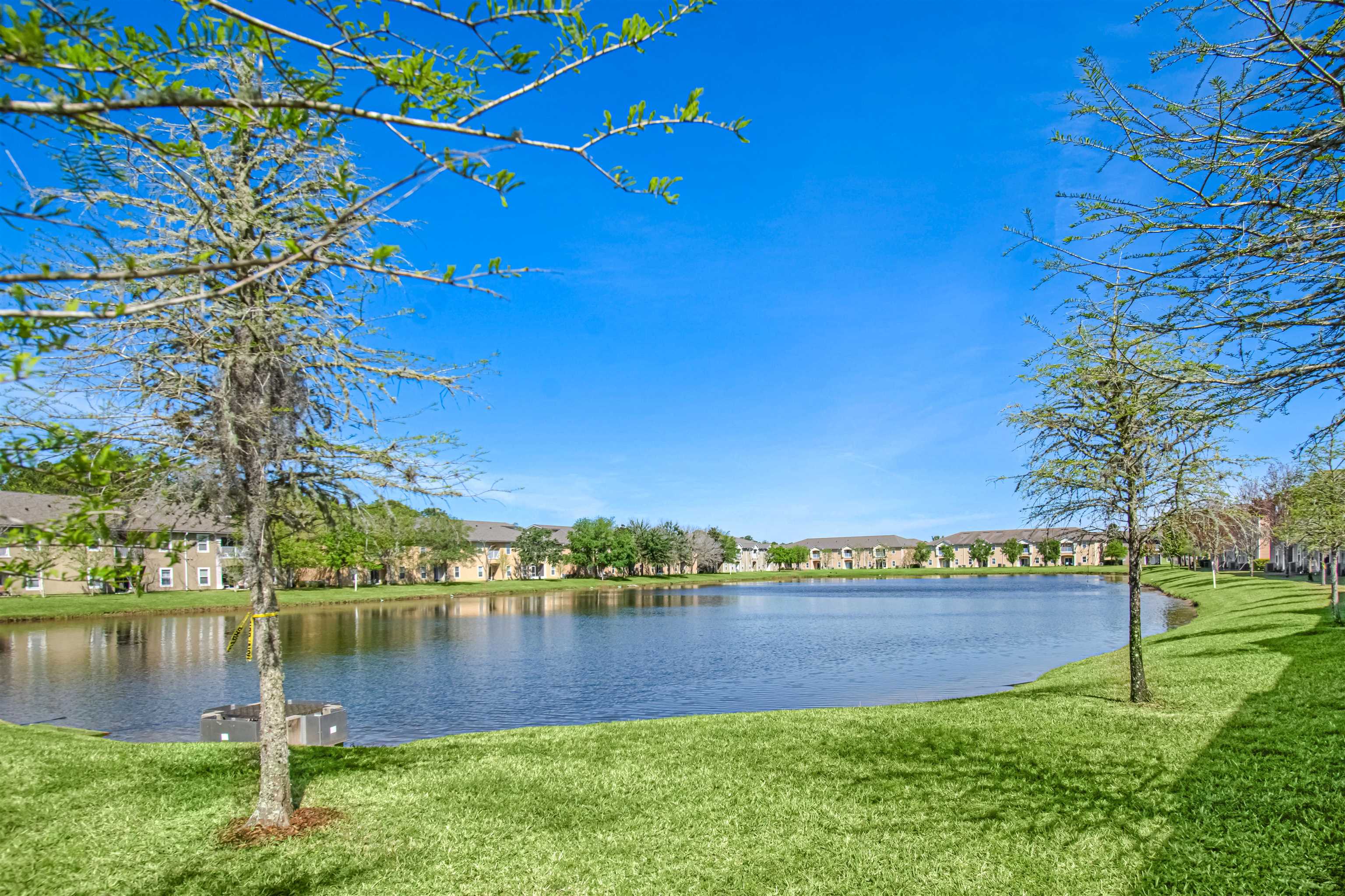 617 Golden Lake Loop St. Augustine, FL 32084 - Photo 6 of 25 a view of a lake with houses in the back