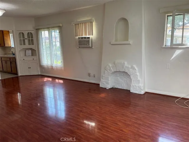 a view of livingroom with hardwood floor and window