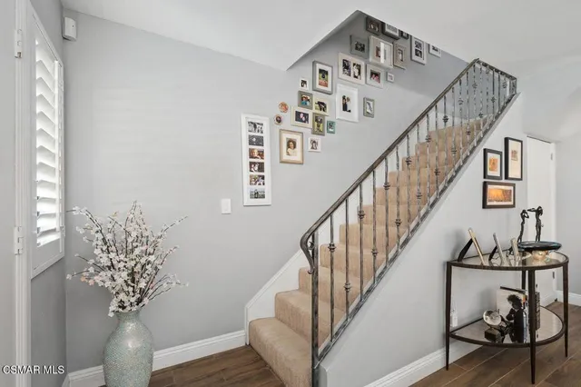 a bedroom with a bed and a closet