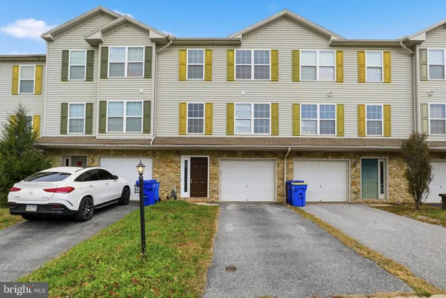 a car parked in front of a building
