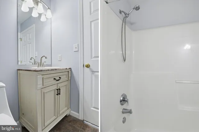 a view of a room with rack on the wall and a window