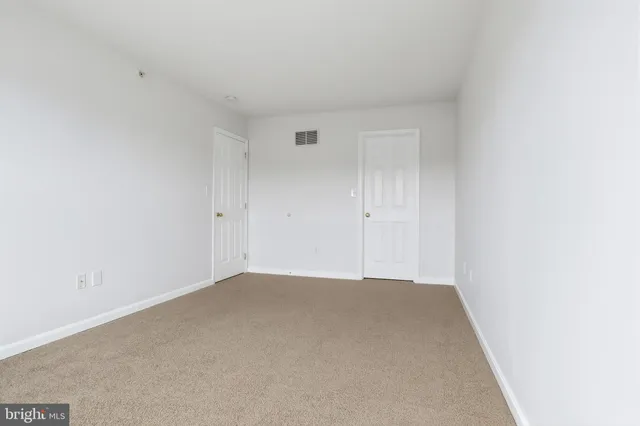 a view of small space with racks on the wall