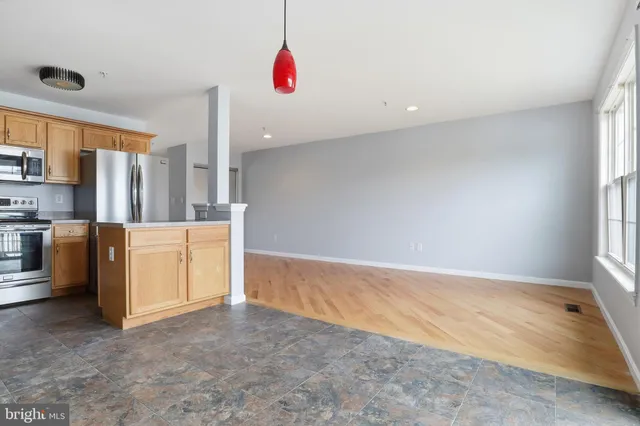 a view of kitchen and utility room