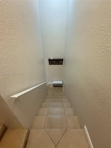 a view of a room with an empty space