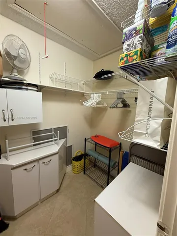 a room with storage and utility