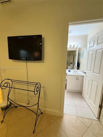 a view of a bathroom with a sink dryer and washer