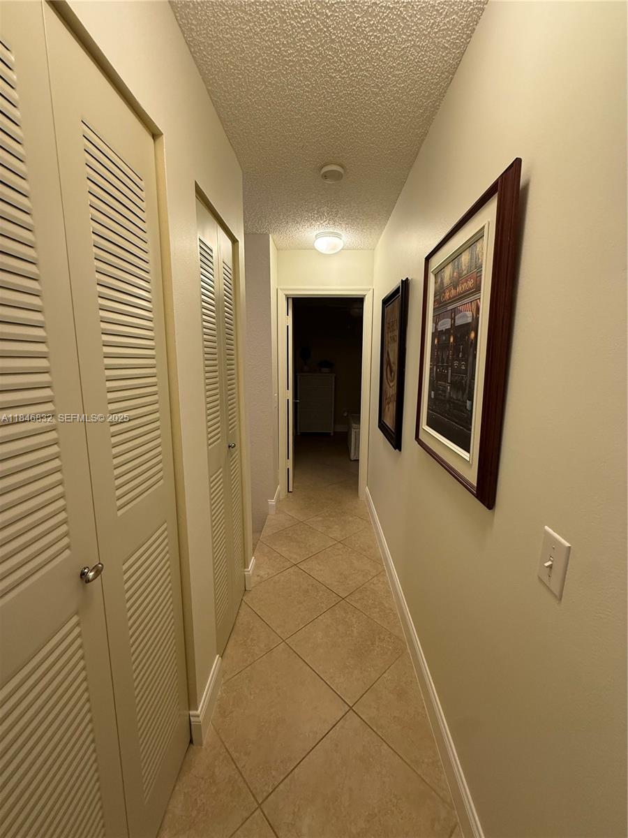 417 Waterside Drive Hypoluxo, FL 33462 - Photo 25 of 52 a view of a hallway