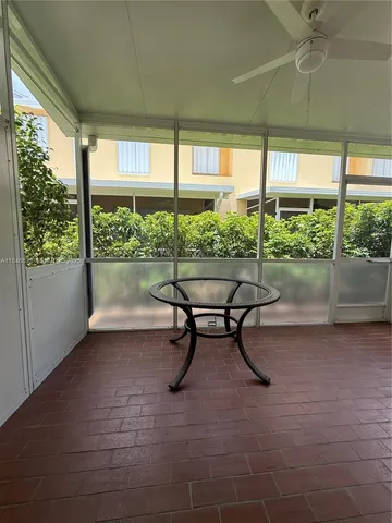 a view of a room with porch and furniture