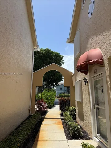 a view of livingroom with furniture and floor to ceiling window