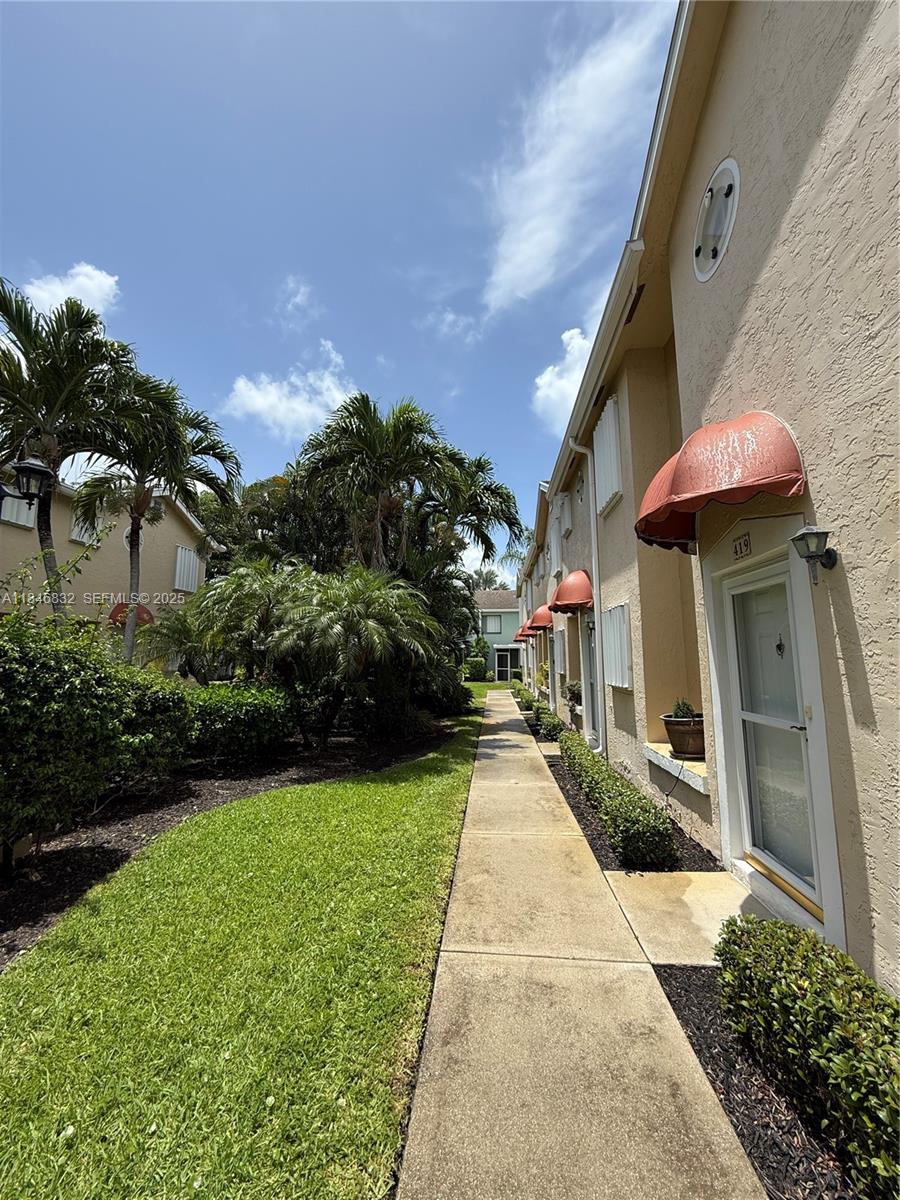 417 Waterside Drive Hypoluxo, FL 33462 - Photo 6 of 52 a view of a volley ball court