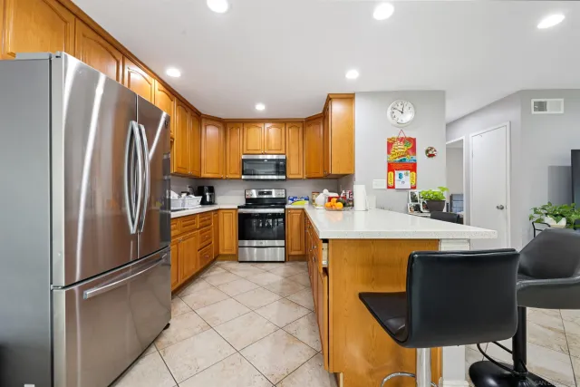a kitchen with granite countertop lots of counter top space
