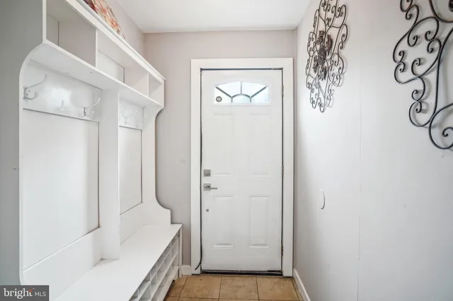 a bathroom with a tub and shower