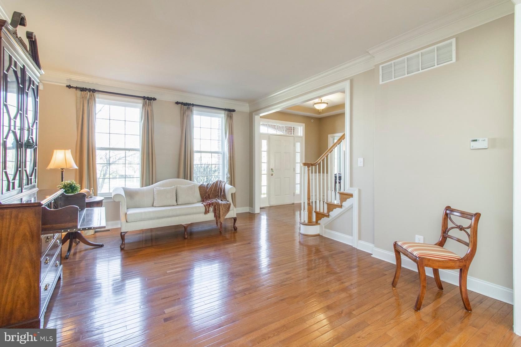 2080 Lincolnshire Road Furlong, PA 18925 - Photo 11 of 62 Living room with custom window treatments