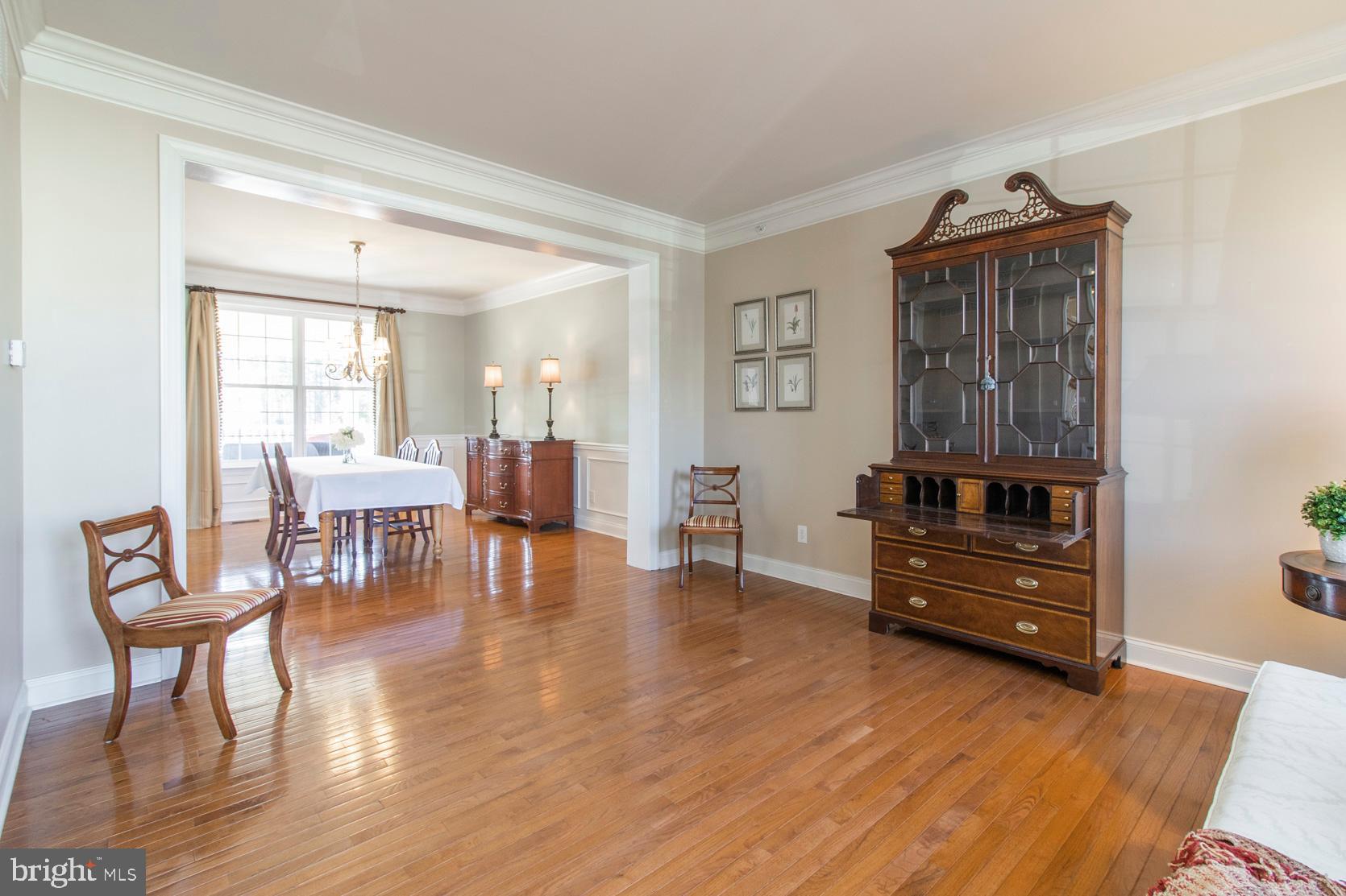 2080 Lincolnshire Road Furlong, PA 18925 - Photo 9 of 62 Living room with stacked crown molding
