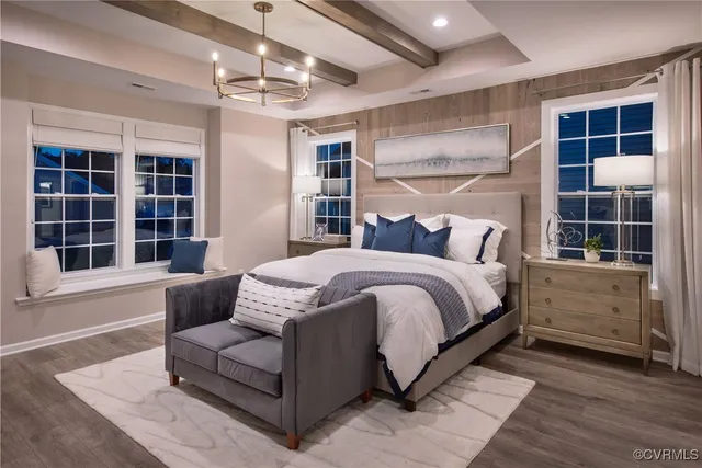 a spacious bedroom with a bed and window